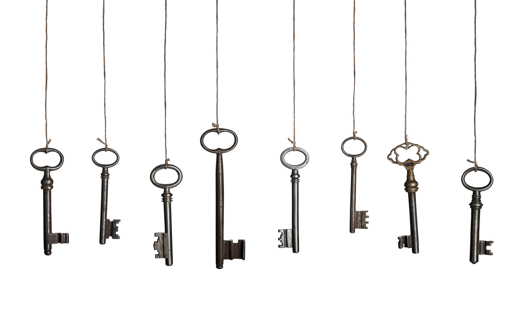 Picture of keys hanging on strings