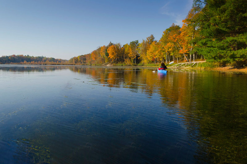 After: The same lake shot without the canoe bow in the foreground.