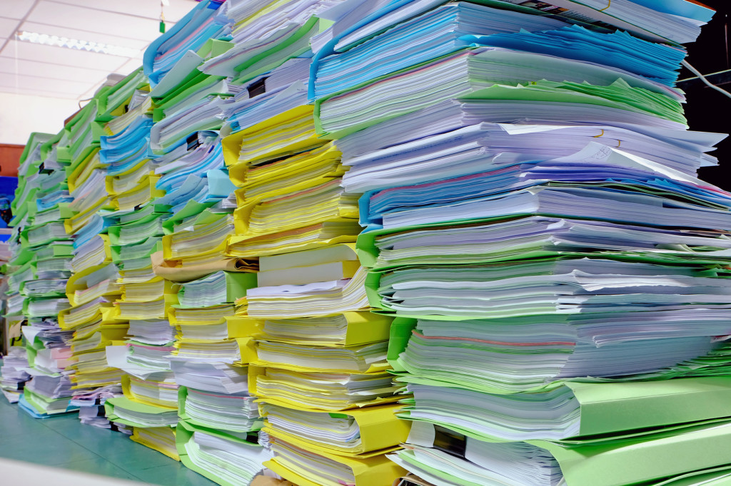 Pile of paperwork on desk
