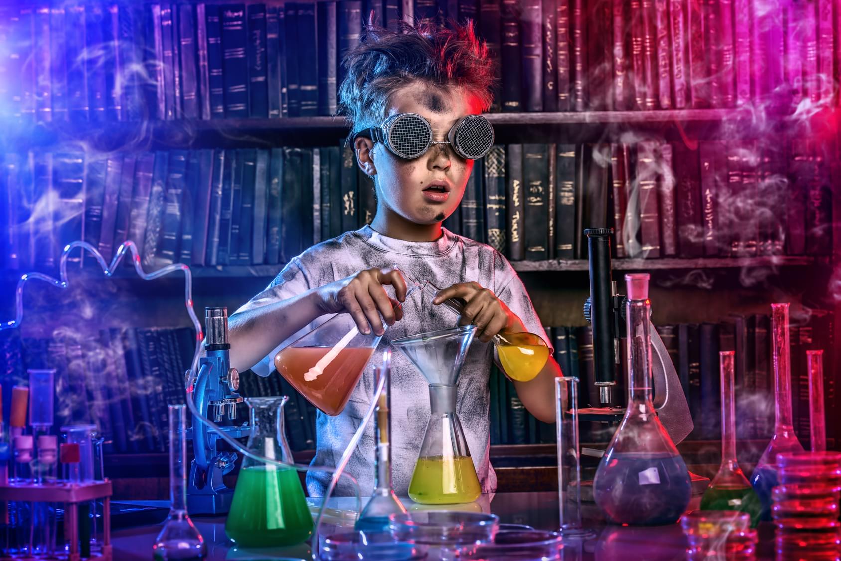 A boy doing experiments in the laboratory. Explosion in the laboratory.